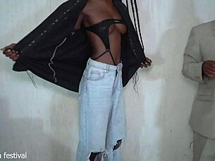 African secretary stripped in the office for her boss, showing off her skinny ebony body.