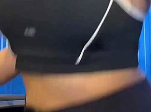 After workout hottie in crowded bathroom enjoys muff diving and cunilingus leading to orgasm and creampie.