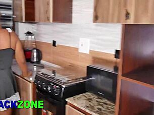 Curvy ebony amateur spreads in kitchen close-up