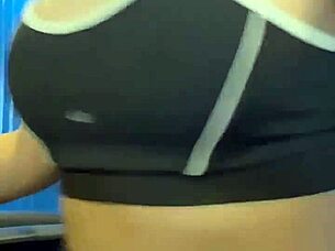 After workout hottie in crowded bathroom enjoys muff diving and cunilingus leading to orgasm and creampie.