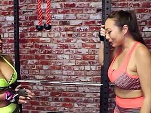 Busty milf licks big tits in lesbian workout.