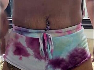 I feel excited changing my bellybutton ring to a stiletto charm in the bathroom with bare feet and heels.