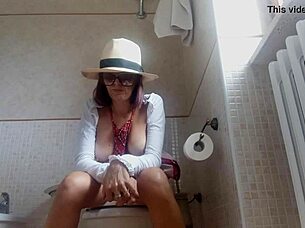 Brunette Amateur Farts Topless on Toilet Hidden Cam