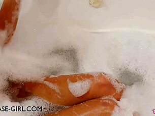 Hey, check out this charming young brunette beauty relaxing in a soothing bath after her day.