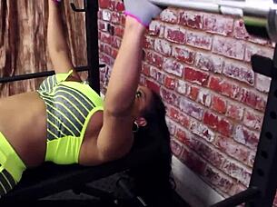 Busty milf licks big tits in lesbian workout.