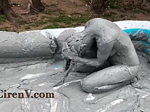 Clay sploshing solo in the pool with tattooed Ciren V