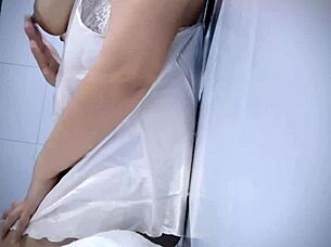 In a playful moment, the chubby babe explores her body, feeling the wetness build up naturally.