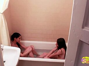 Oh man, these two lesbians got super busy with each other in the hotel room bath