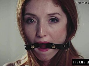 nipple clamps and ball gag drive horny redhead to intense bdsm orgasm