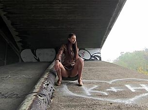 Check out Kitty in this outdoor pissing scene for some solo softcore fun