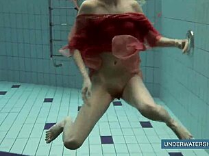 Hey, check out Katya Okuneva in her red dress by the pool