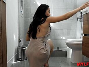 Woman gets aroused cleaning the room.