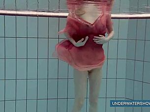 Hey, check out Katya Okuneva in her red dress by the pool