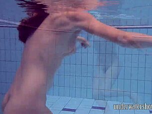 Lucy Removes Bikini While Swimming In Pool