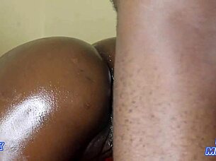 This horny ebony amateur bends over for some intense anal doggystyle action, taking cum deep inside her oiled ass.