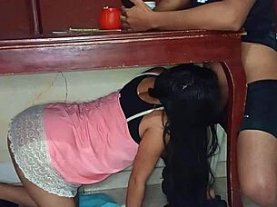 my secret lover hides under the table sucking cock