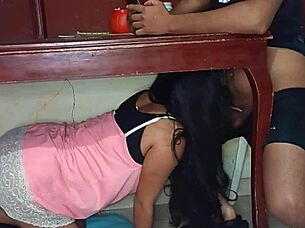 my secret lover hides under the table sucking cock