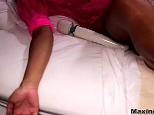 Maxine X gets caught riding Scott Rhodes' big black cock cowgirl style before he facializes her with cum.