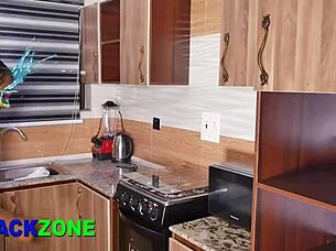 Beautiful step mother showed off her curvy figure in the kitchen during a homemade moment.