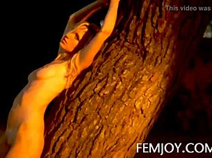 German busty blonde teen 18+ corinna poses at sunset in outdoor softcore scene.