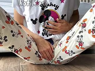 This skinny teen 18+ in pajamas shows off small tits while masturbating close up to a squirting orgasm.