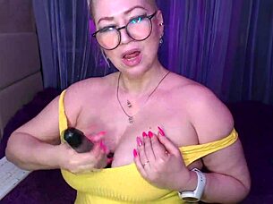 A Cool Busty Vulgar Mature Whore In Glasses With A Ponytail On Her Head