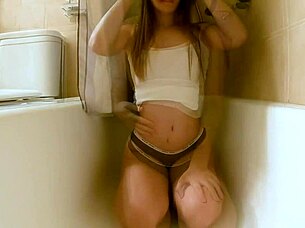 Petite Brunette Enjoys Solo Bath Time With New Sex Toy