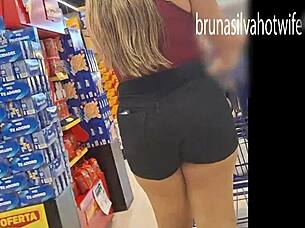 I film hot blonde in market spying on her voyeur style