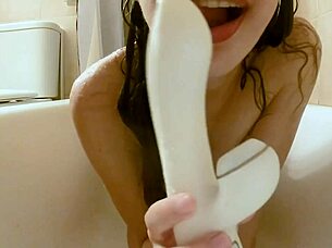 Petite Brunette Enjoys Solo Bath Time With New Sex Toy