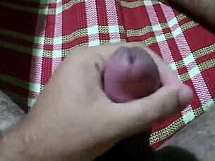 Man experiences intense cumshot pleasure in steamy scene.