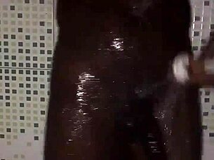 Amateur guy strokes big black cock solo before jumping into quick shower for cleanup