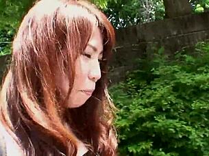 pretty asian brunette rie obata kneads her hairy pussy with a vibrator while bent over in lingerie