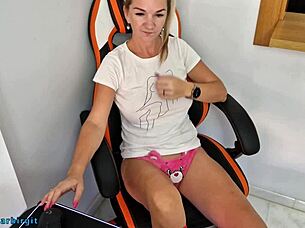 cute amateur blonde milf watches porn and masturbates with toy