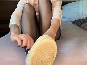 i love showing off my black nylon feet in tight nylons for fetish fun