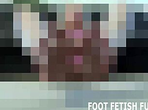 this dominant woman demands a submissive guy to worship and suck her perfect toes in a bdsm session