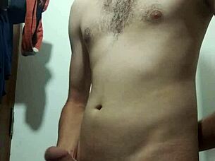 Young skinny amateur undresses for intense solo cock masturbation in bathroom.