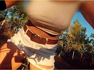 Hey, are you ready for this amazing milf flashing her tits on a wild public bike ride?