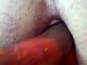 Toying solo with anal toys for intense masturbation pleasure.