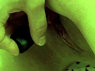 Teen Asian in red lingerie inserts a toy into her pussy