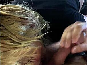 streetwalker performs oral service outdoors, spitting out and then continuing the act on the client