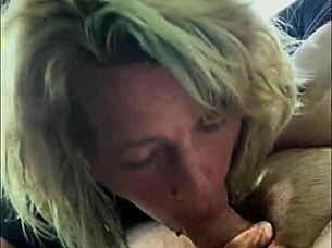 streetwalker performs oral service outdoors, spitting out and then continuing the act on the client