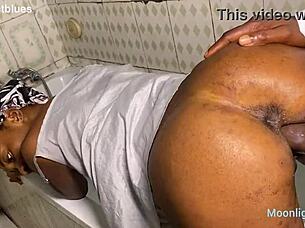 In the bathroom by the pool, a horny housewife bent over to take a big black cock doggystyle in homemade action.