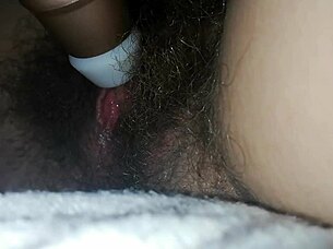 Oh god, why is my hairy pussy so wet from this quick vibrator orgasm in bed?