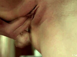 Amber A undresses solo fingering her wet pussy deeply