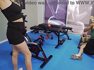 She works out hard at the gym, getting spanked and fucked roughly by muscular bodybuilder.