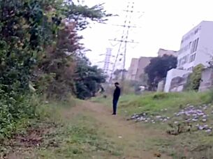 Naughty redhead punk flashes shaved pussy without panties in public park outdoors