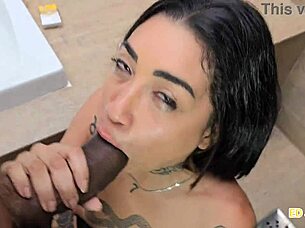 Tattooed beauty feels the thrill tugging oiled tits in heels