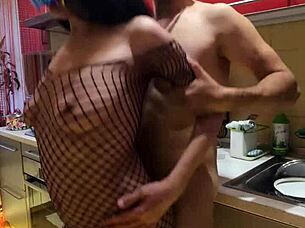 Amateur milf wife enjoys passionate kissing before intense assfucking in stockings on kitchen counter