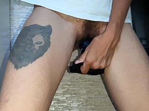 She thrusts a dildo into her hairy pussy while I stroke my shaved one to orgasm