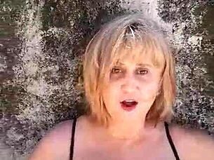 blonde milf with big natural tits spreads huge pussy lips and nipples on beach fetish